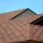 Roof covered with bituminous tiles.